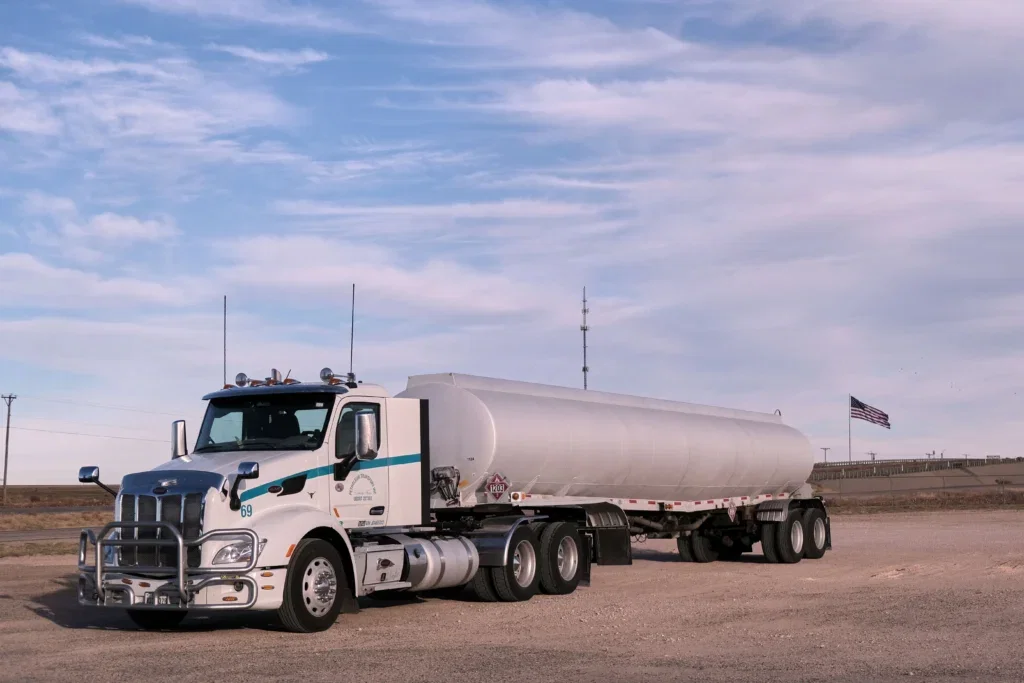 A commercial truck at a lay-by on an American freeway, illustrating the truck accident damages available should an accident occur.